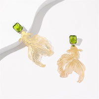 أقراط ذهبية منحوتة يدوياً