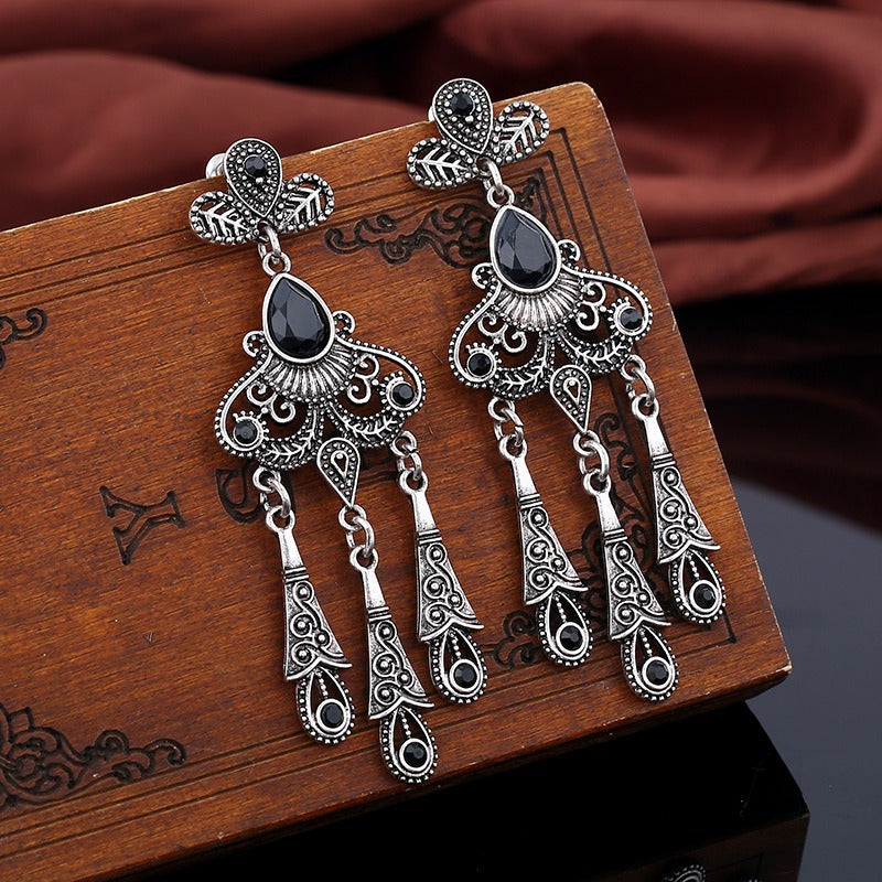 European and American jewelry retro ethnic style hollow leaf gemstone water droplet tassel earrings