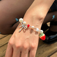 Sweet strawberry bow bracelet Bracelet temperament versatile imitation pearl vacation jewelry